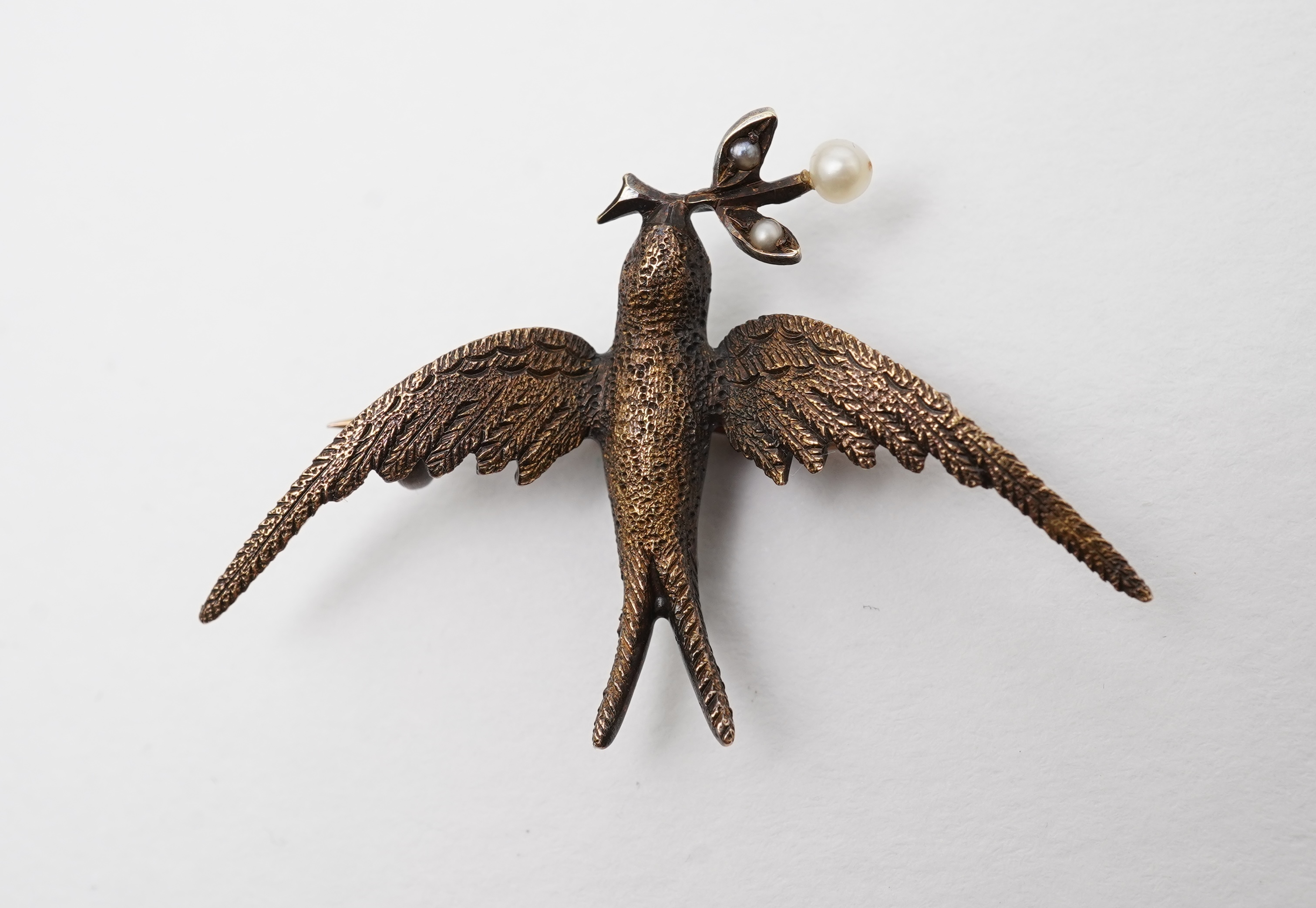 An Edwardian gold and seed pearl brooch, early 20th century